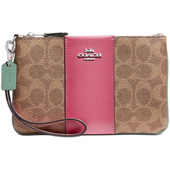 Coach Handbags - Coach Wristlet like New With Tags, Pink band!